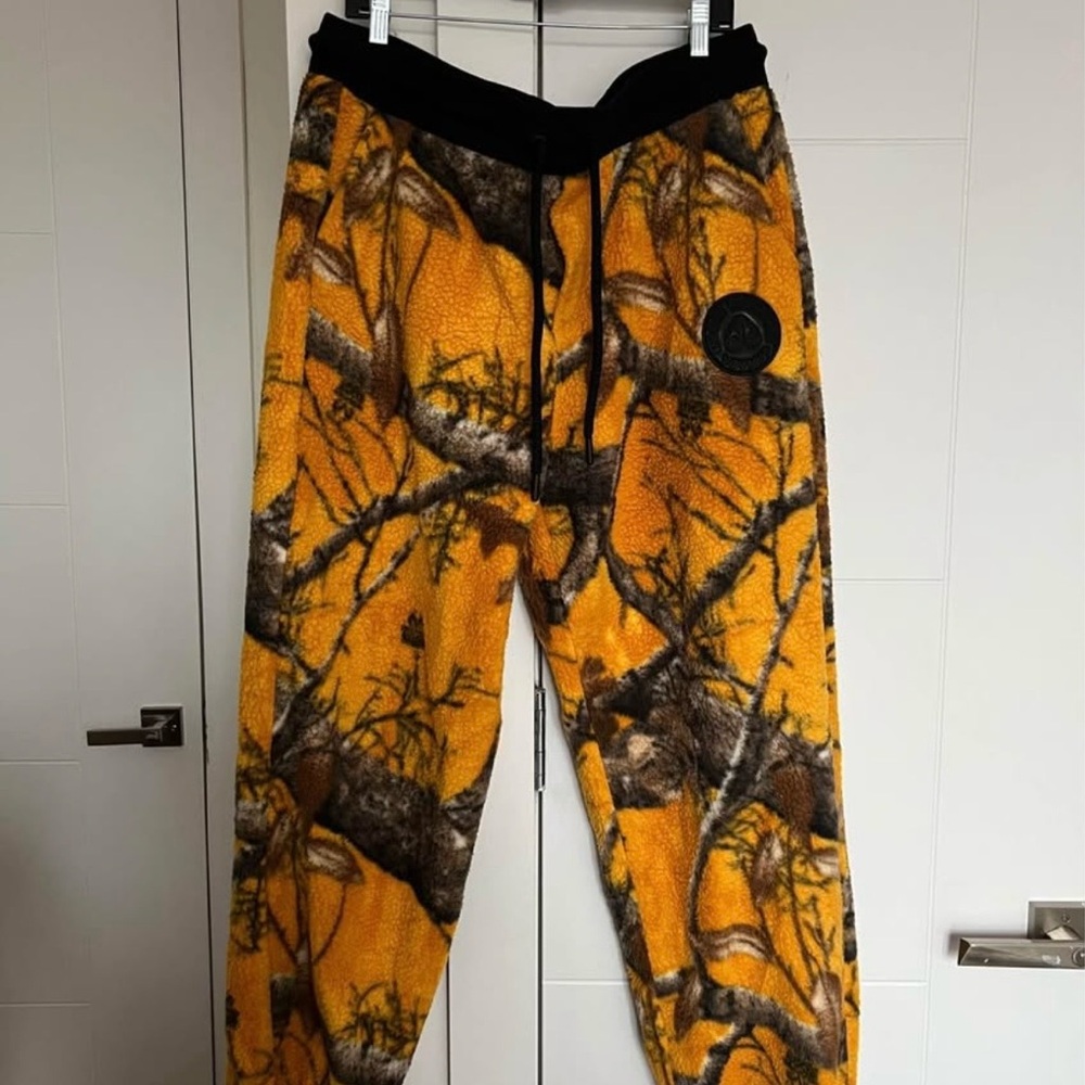 Moose Knuckles x Post Malone Orange and Black Camouflage Fleece Joggers